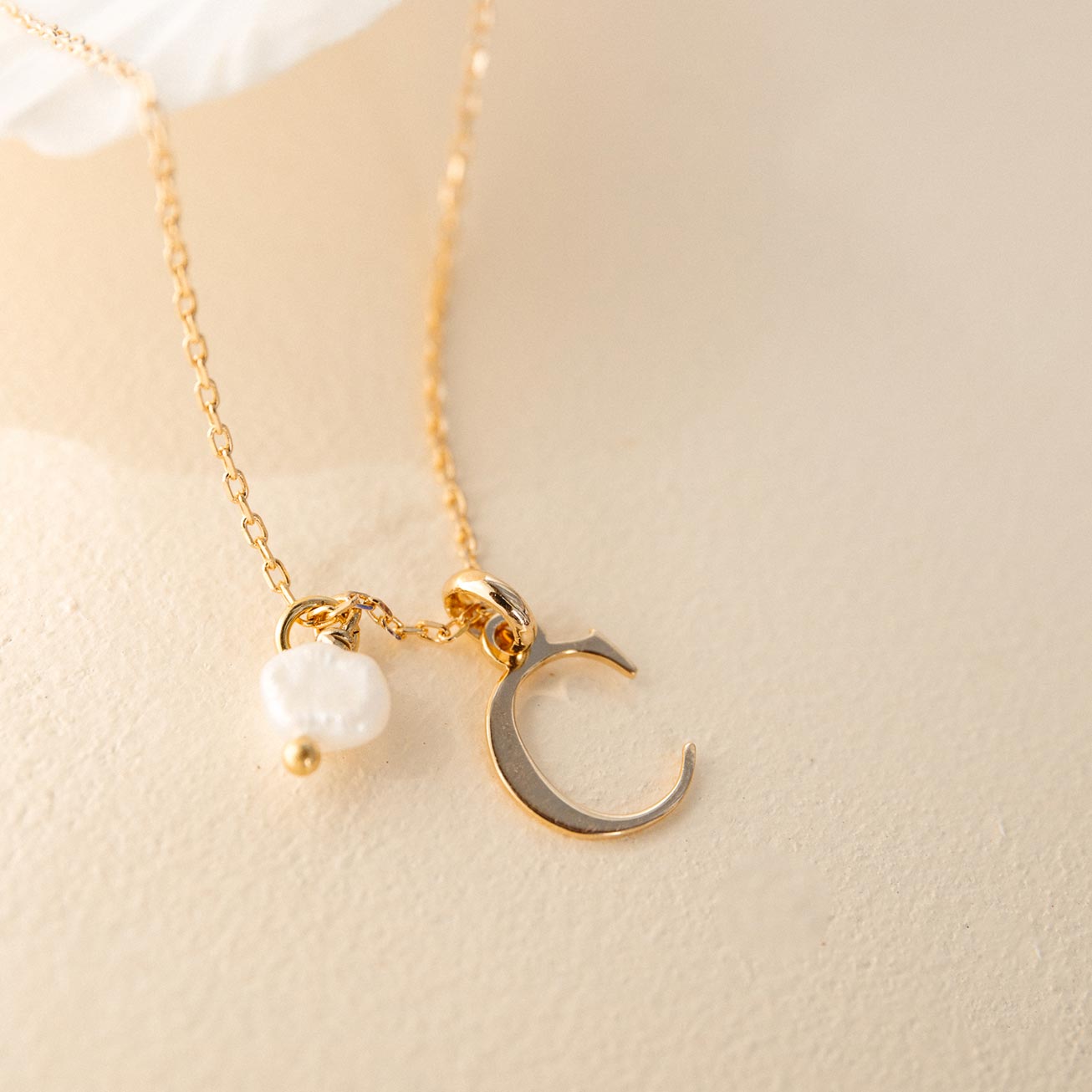 Collier lettre perle